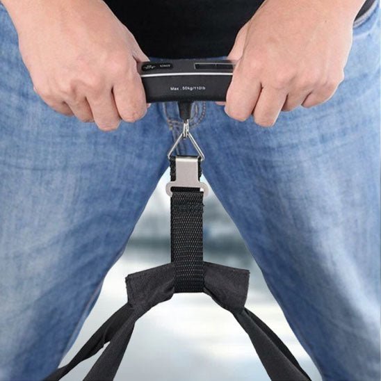 pese-bagage portable ecran lcd avec homme qui souleve valise