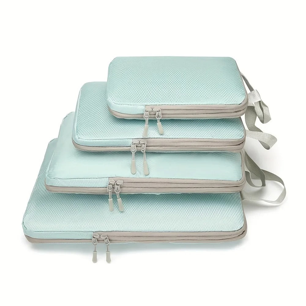4 cubes de compression voyage bleus de différentes tailles