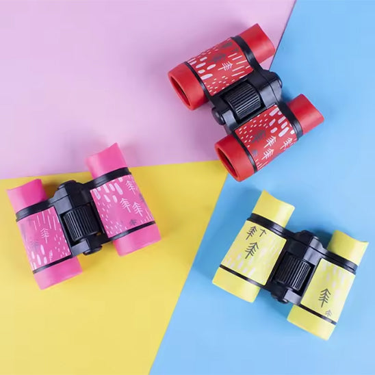 trois jumelles enfant binokid colorés