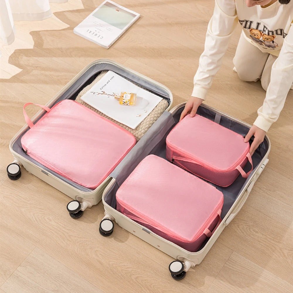 organisateur de valise set 3 pièces compressible rose dans valise