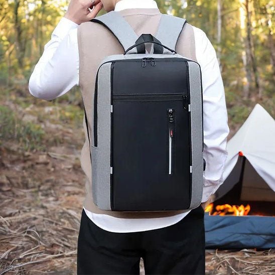 homme avec un sac à dos en cabine avion pour pc portable port usb noir