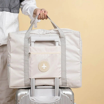 sac cabine avion sur valise