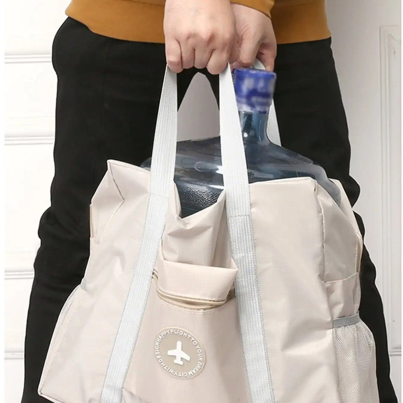 sac cabine avion solide avec une grosse bonbonne d'eau à l'interieur