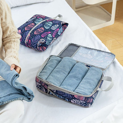 jeans dans sac de rangement valise à compression